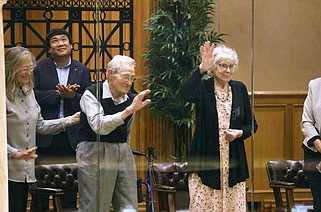 Thell Ellison (left) and his wife of 82 years, Margie, of Natural Dam are honored as being the longest married couple in Arkansas during the House session on Wednesday, May 1, 2024, at the state Capitol in Little Rock.
(Arkansas Democrat-Gazette/Thomas Metthe)